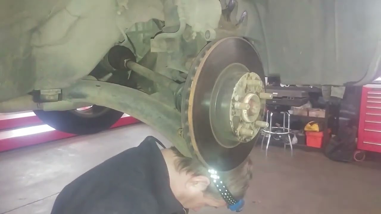 2000 Subaru Forester Front brake pad replacement brake rotor too.