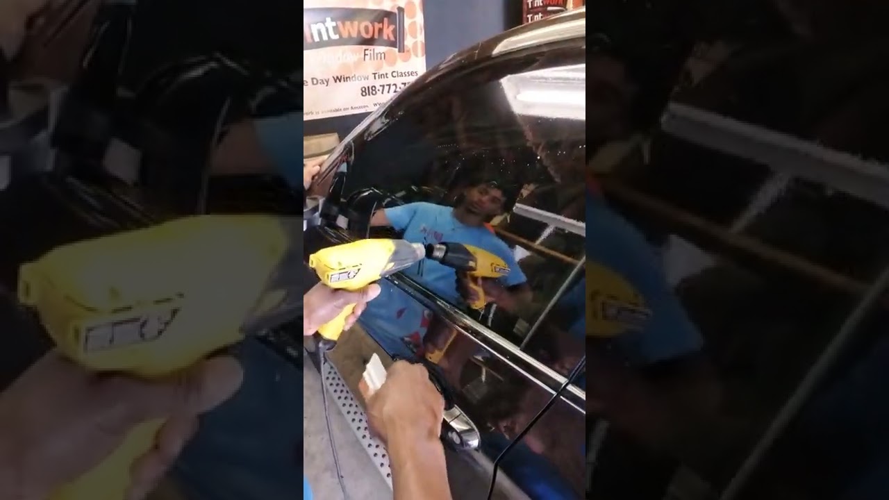 learning how to tint a drivers window on a 2018 BMW X5.