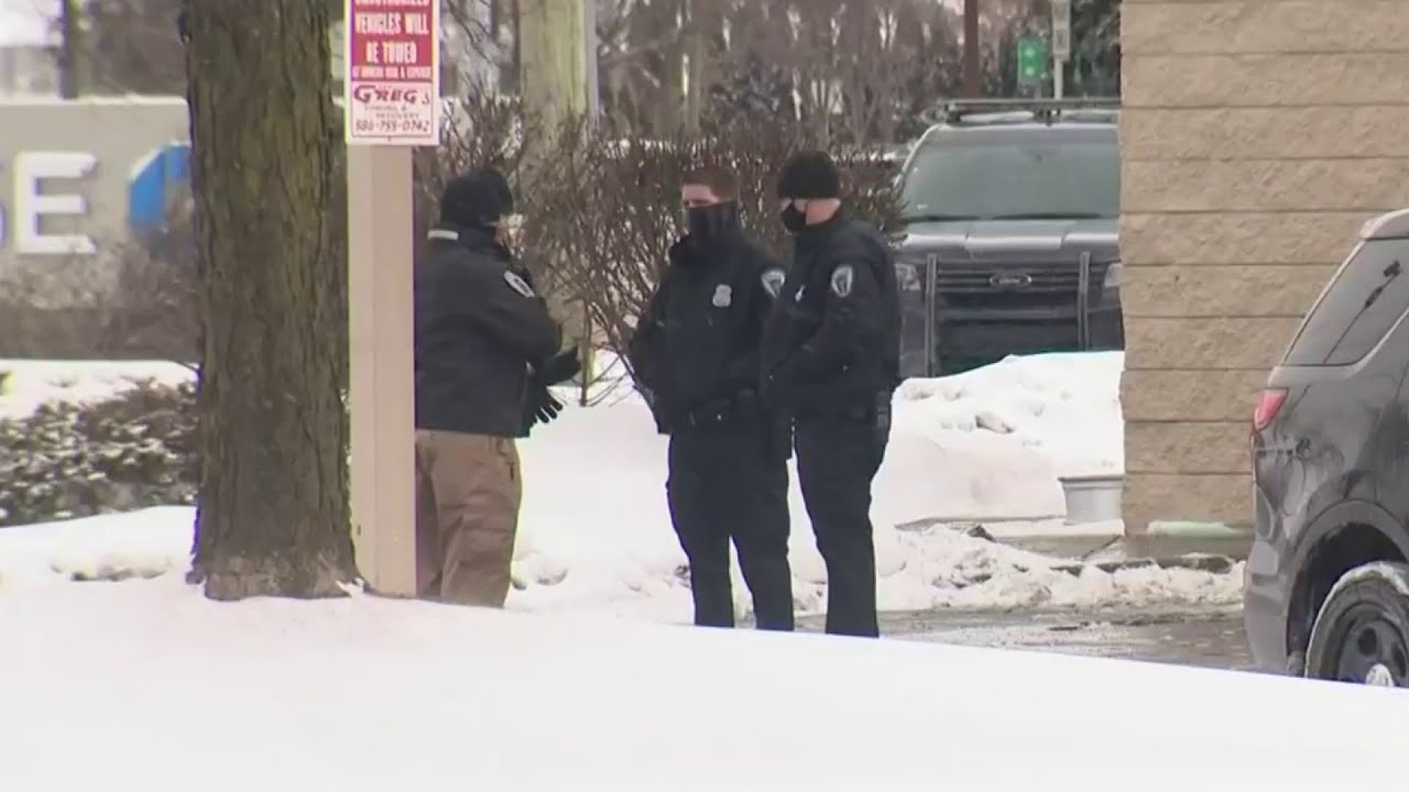 Deadly stabbing victim found in Troy parking lot; Person of interest in custody