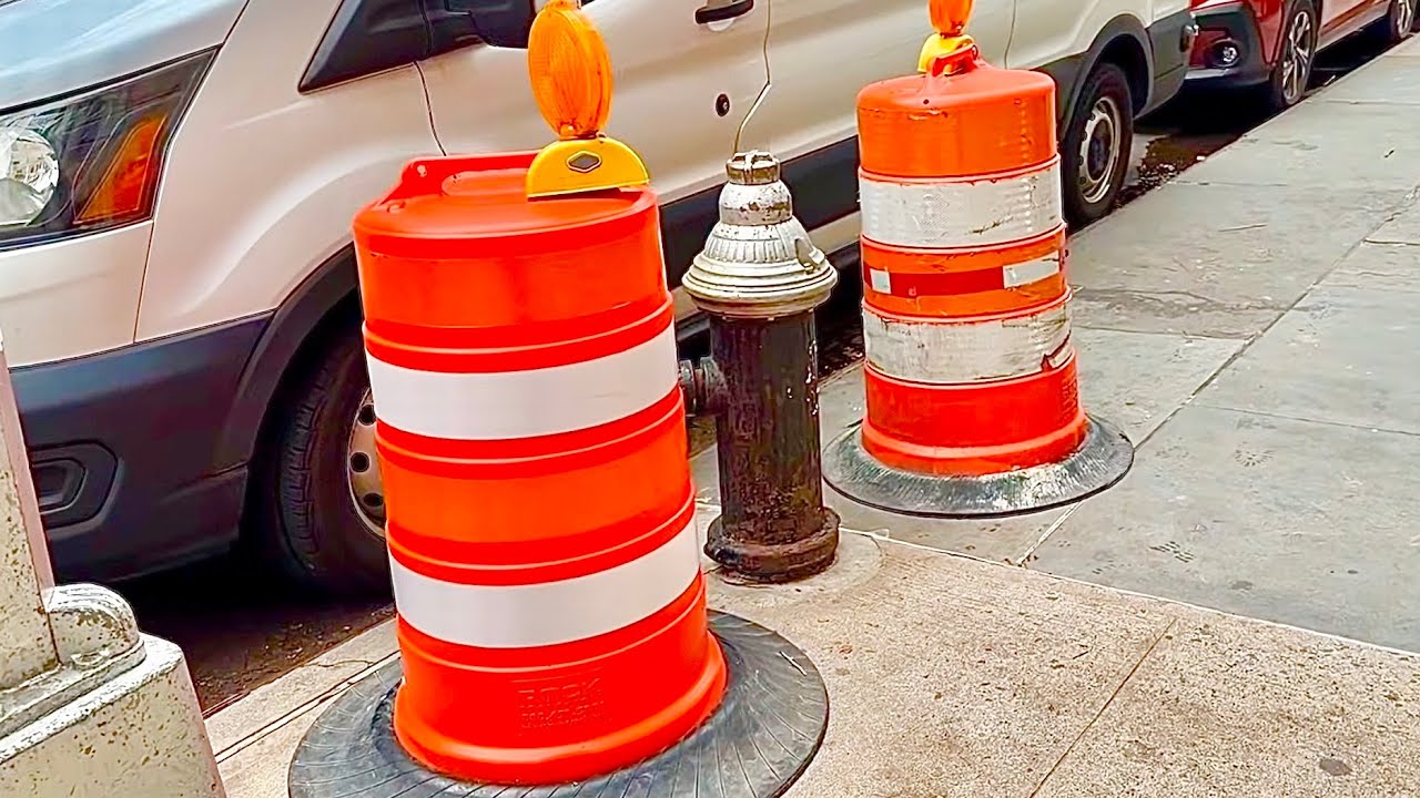 SEVERAL **BLOCKED HYDRANTS** BY ILLEGALLY PARKED MOTORISTS DURING RECENT FIRES IN NEW YORK CITY.