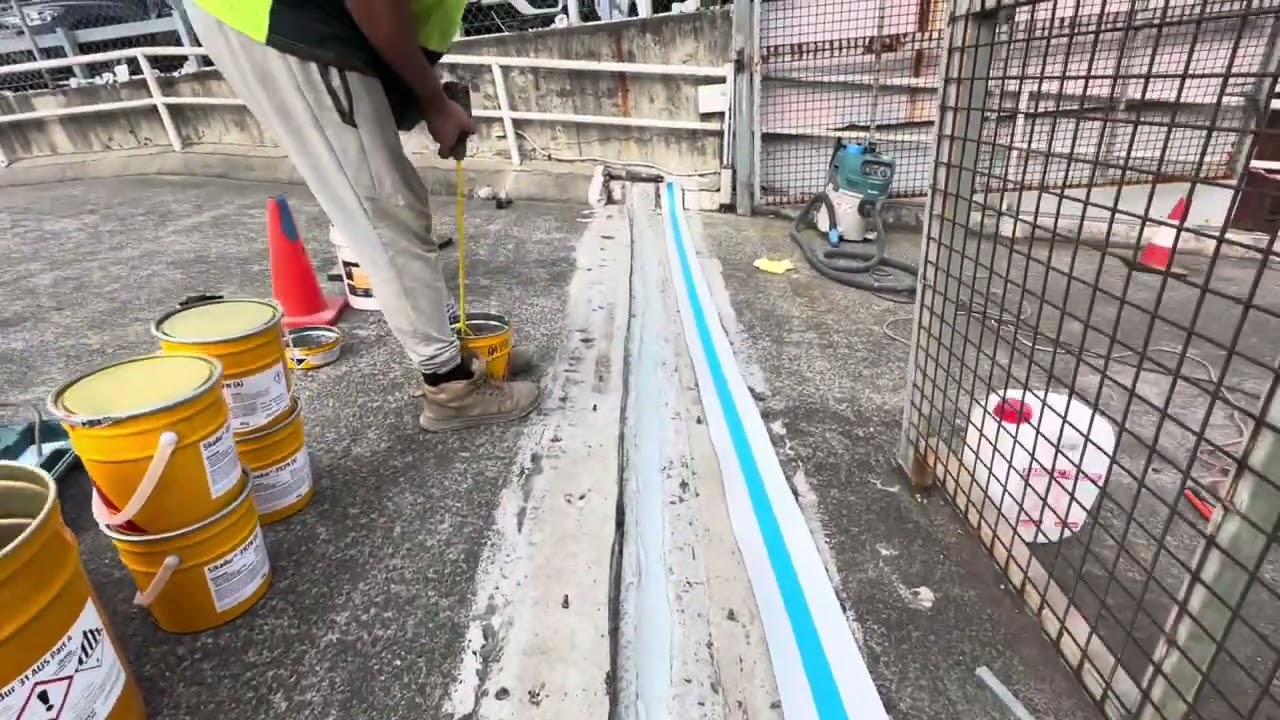 Installation of Sikadur Combiflex in a expansion joint