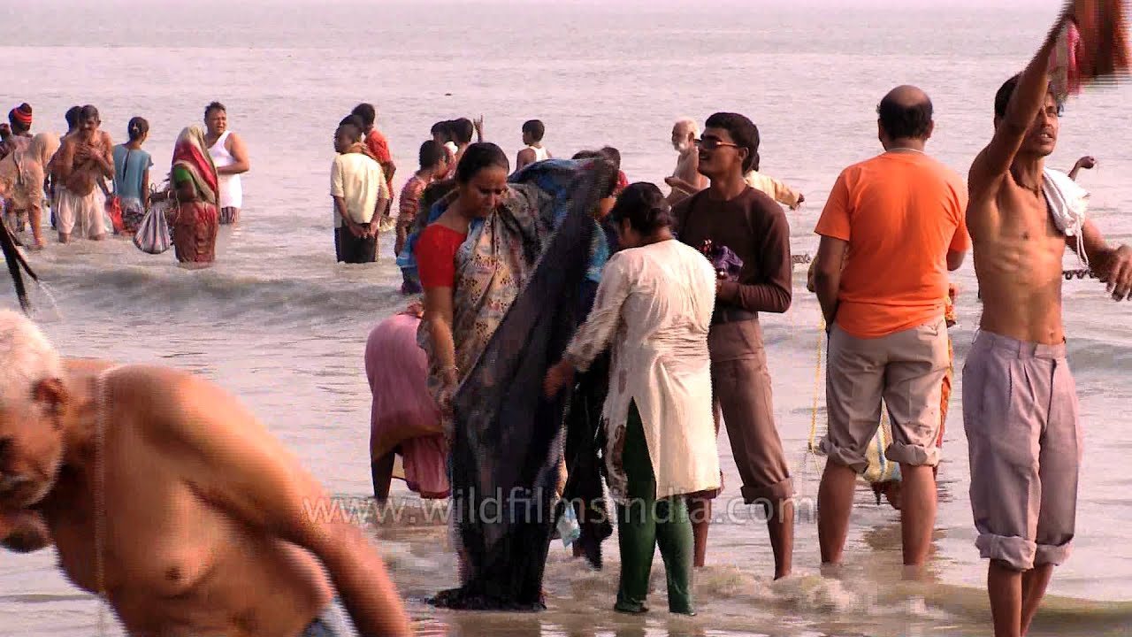 Indian Hindu Pilgrims take the holy dip at Gangasagar Island