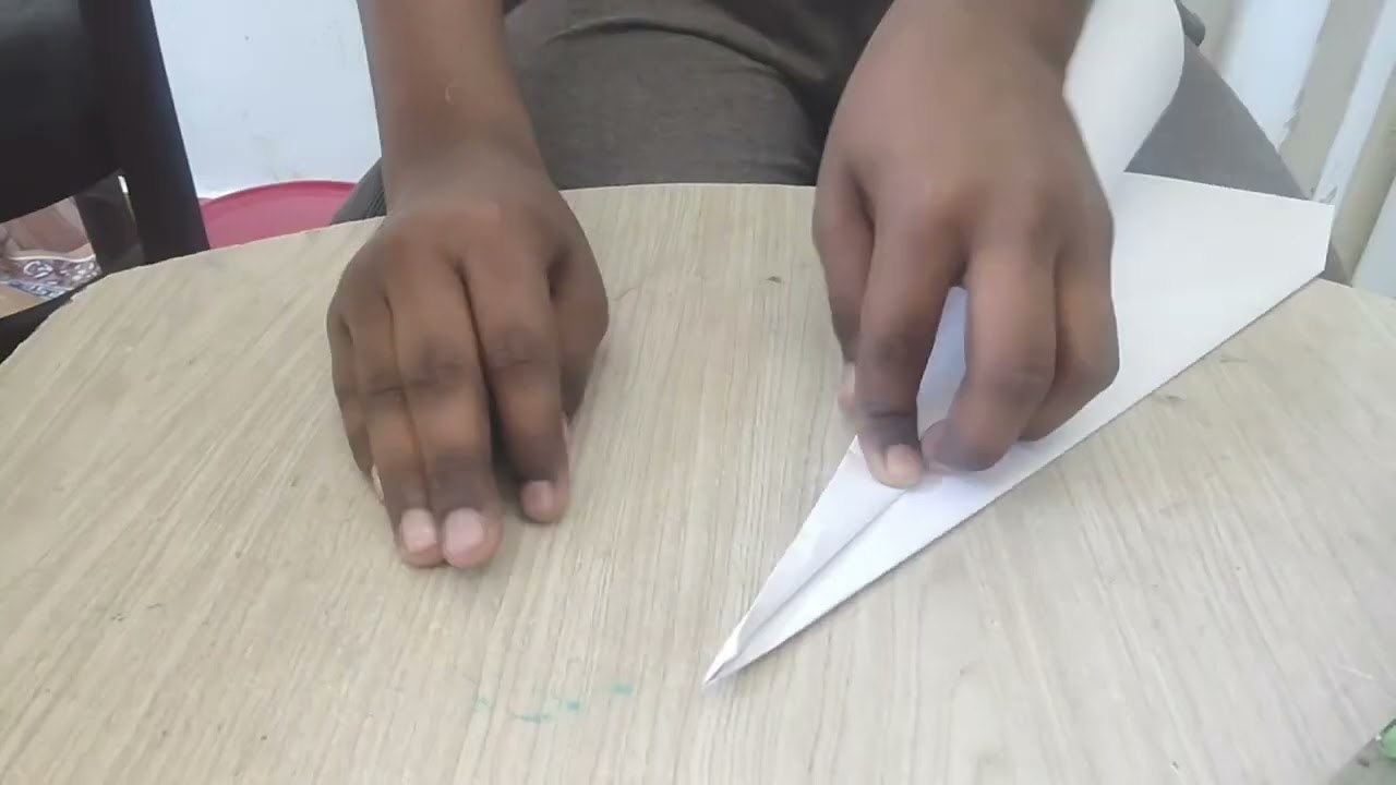 Rubber band paper plane