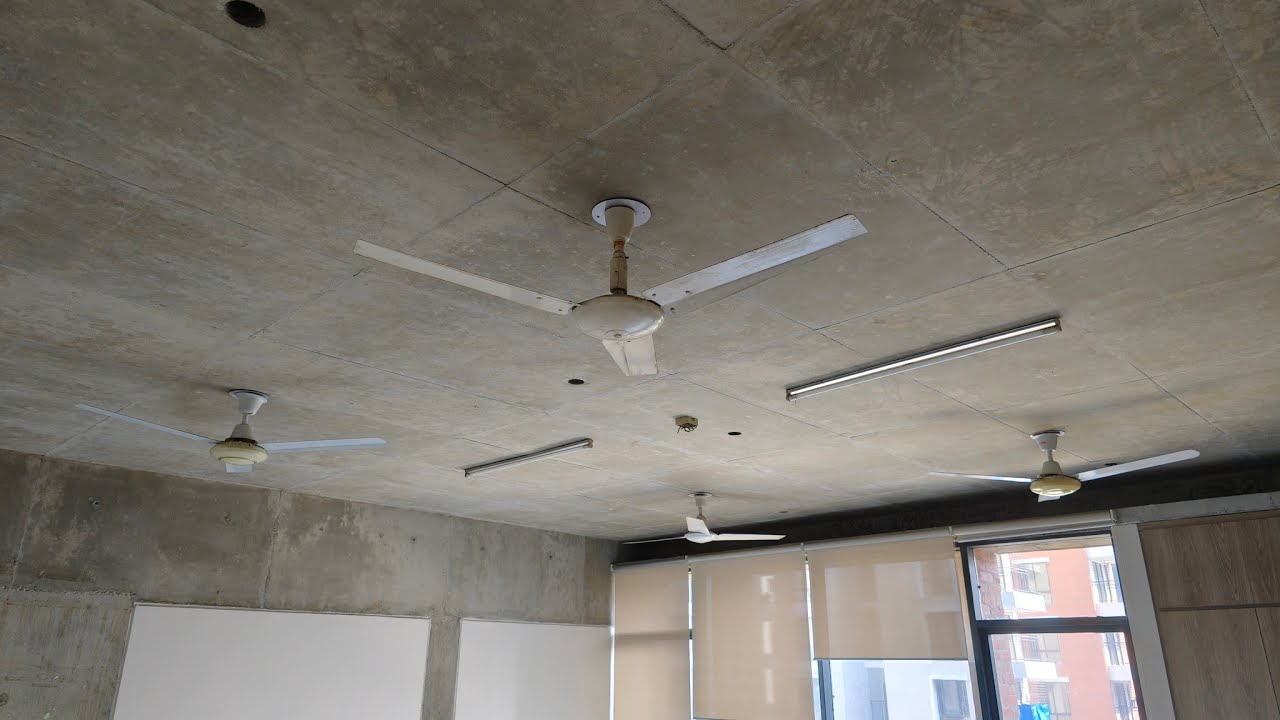 Four ceiling fans in a classroom