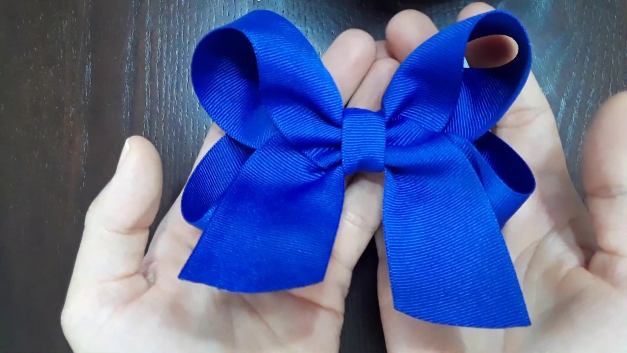 Como hacer un moño boutique con puntas. | How to make a boutique hair bow from grossgrain ribbon