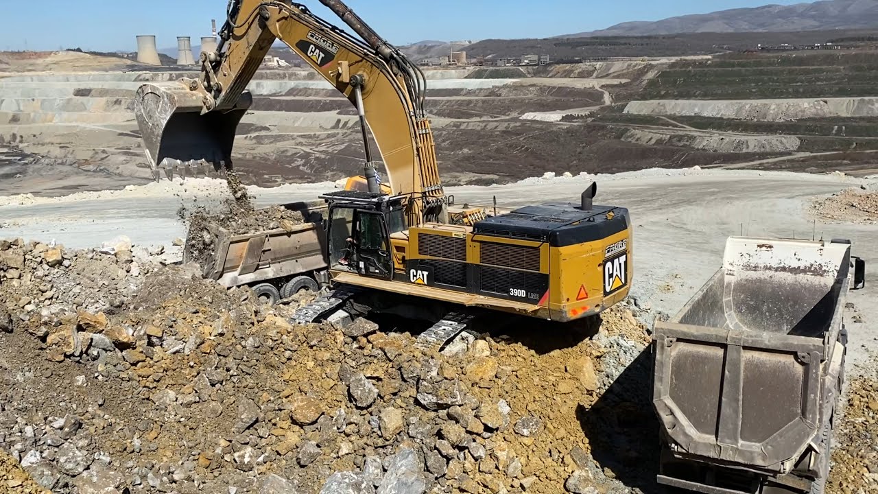 Caterpillar 390D Excavator Loading Mercedes Arocs Trucks