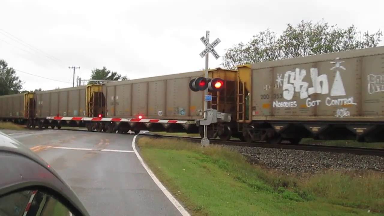 CSX Coal Train Slowly Passes Backing Up Traffic