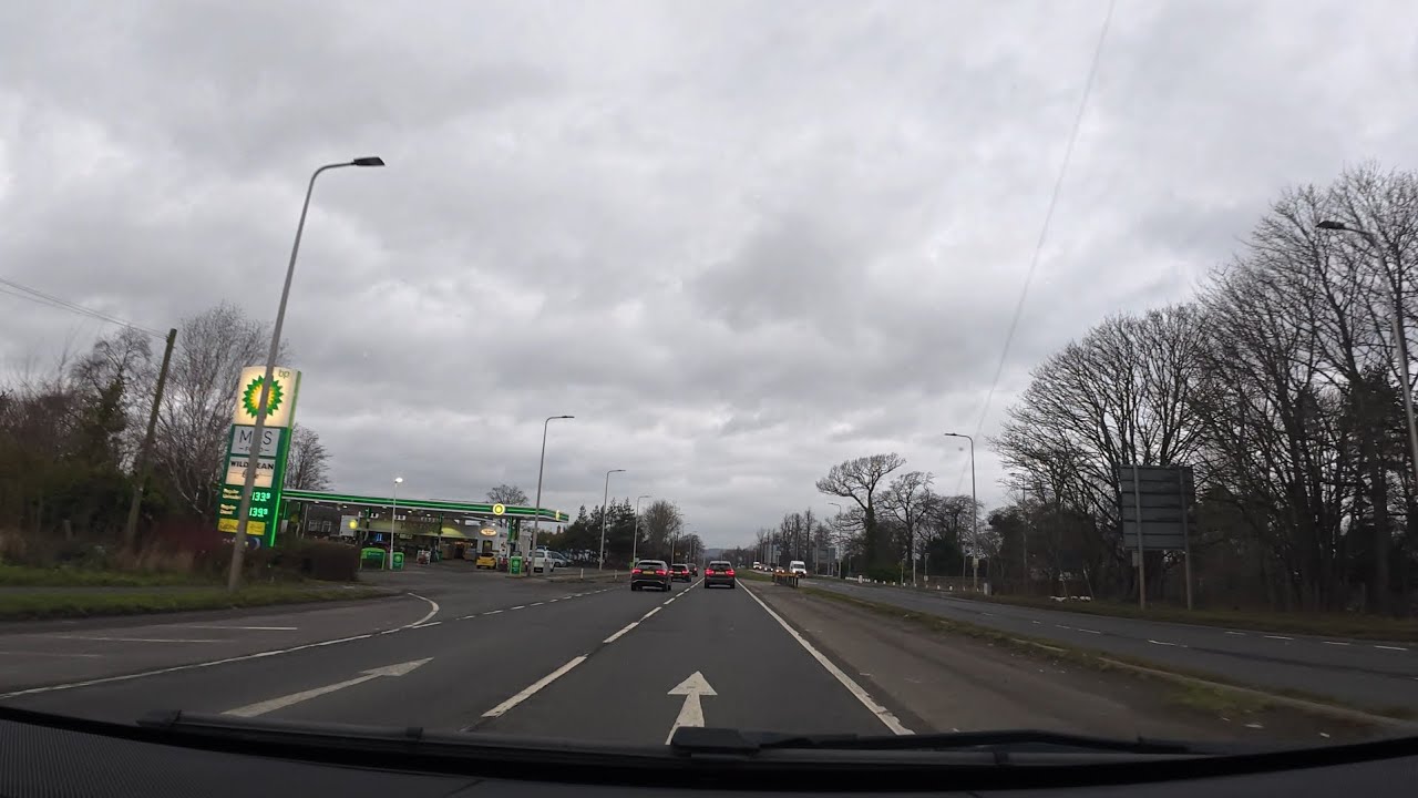 Glasgow Road , Edinburgh passing the airport, Driving raw footage