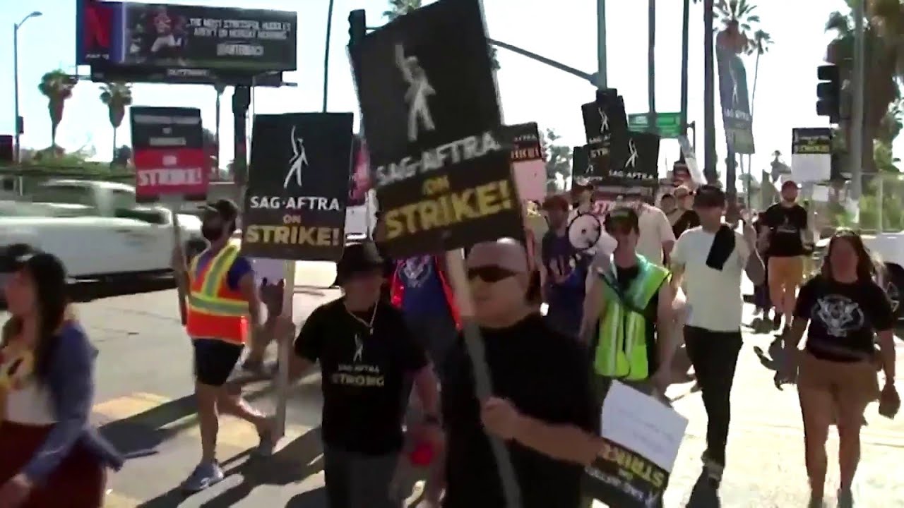 Hollywood actors join writers on strike, demanding higher pay and AI protections