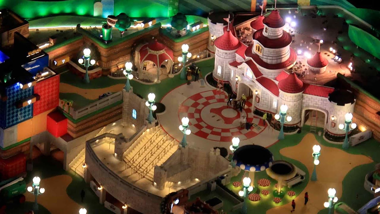 Aerial video of areas of Epic Universe at night
