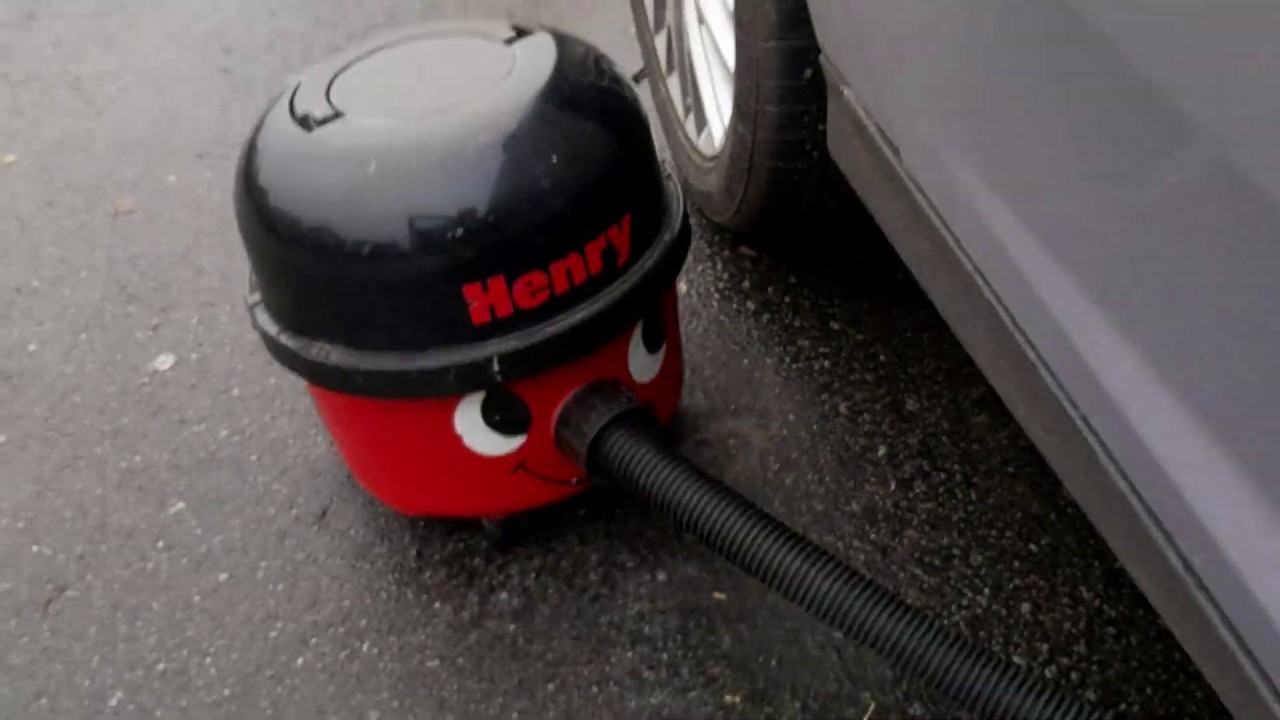 Vintage 1980s Numatic Henry hvc200  vacuuming  the car