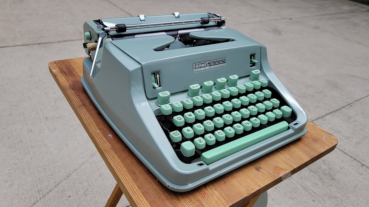 Typing outside on a 1967 Hermes 3000 typewriter