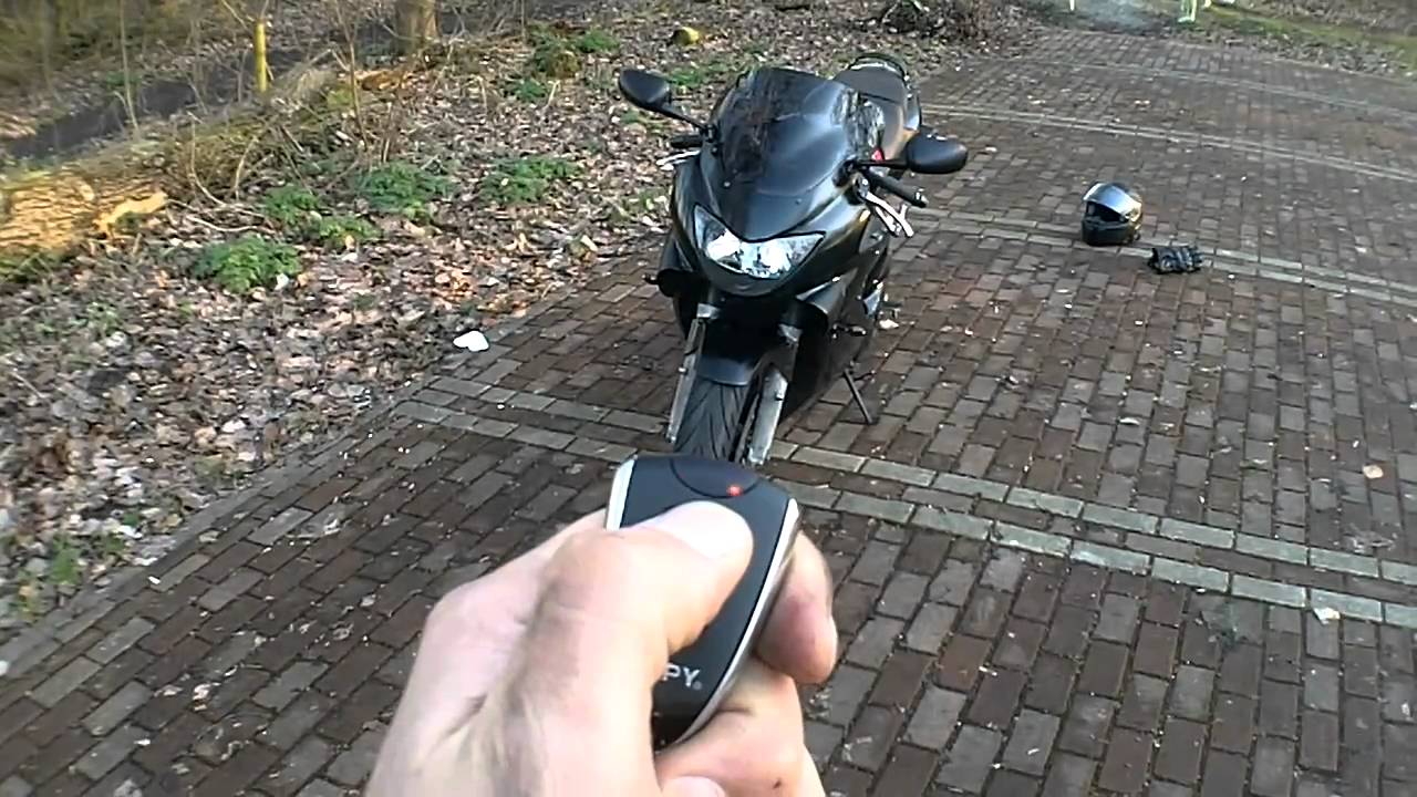 How to set the shock sensor sensitivity on a Spy motorcycle alarm.