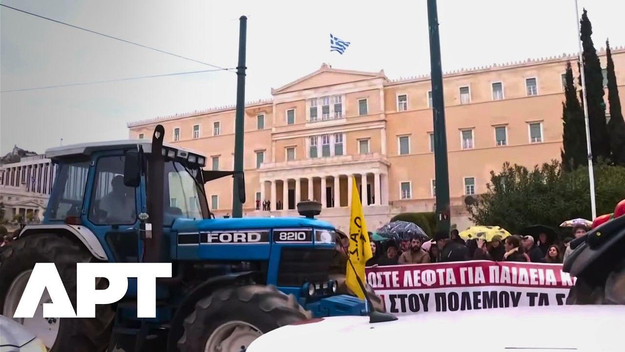 Greek Farmers Storm Athens with Tractors in Mass Protest | WATCH | APT