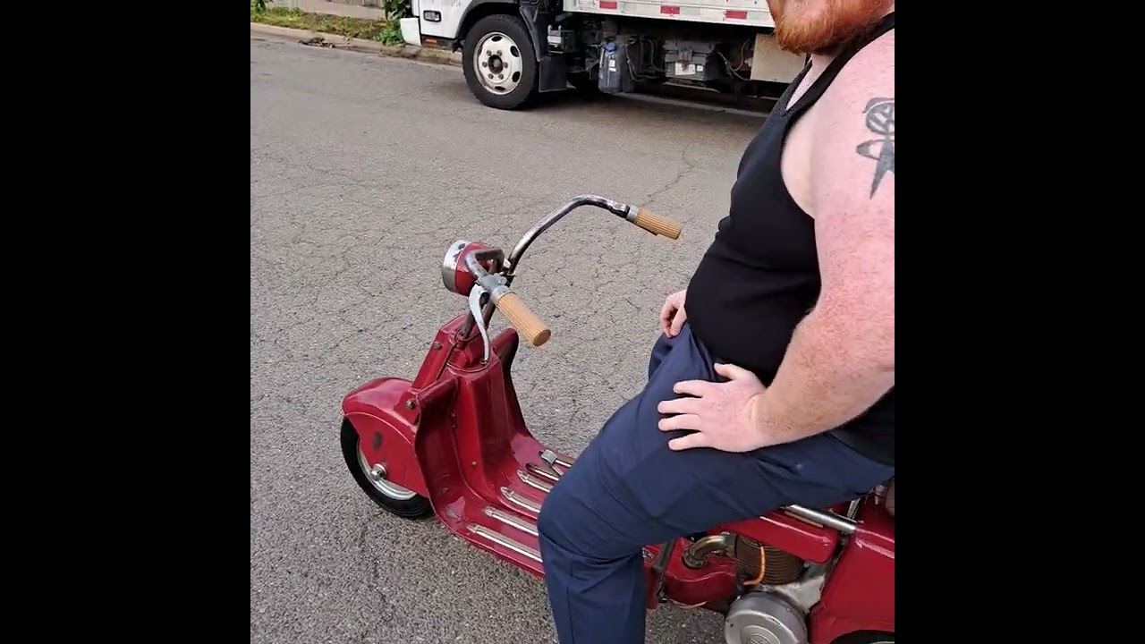 1948 Lambretta 125M model A. My kid riding!