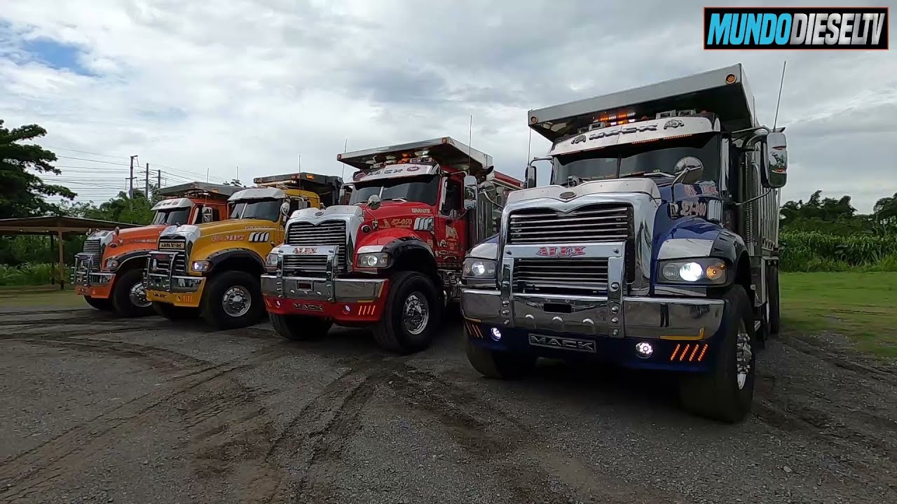 Four Mack Granite Dump Trucks on the job