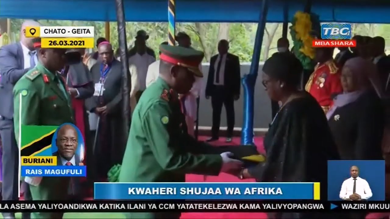 Mama Janeth Magufuli akikabidhiwa Bendera ya Taifa la Tanzania Mbele ya Rais Samia Suluhu