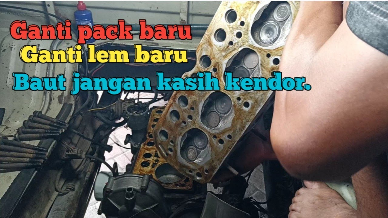Perakitan kembali silinder kop Mitsubishi Colt T120.