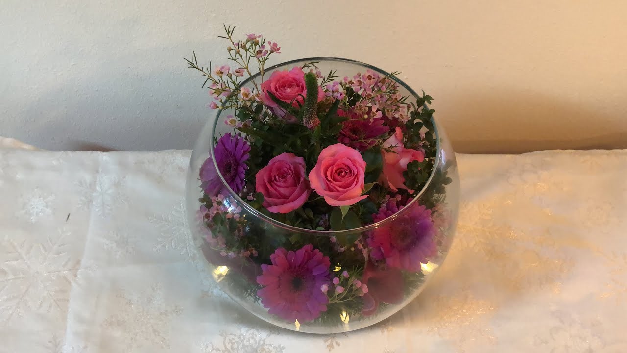 Arreglo floral en pecera