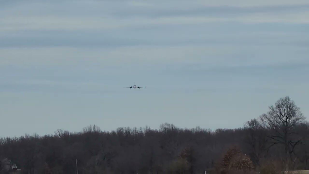Cessna 310 low pass.