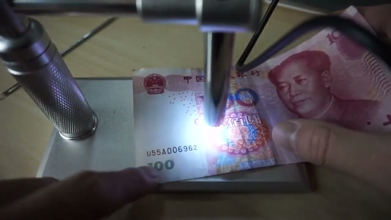显微镜放大100块人民币100倍，这个精细的防伪标识你肯定不知道