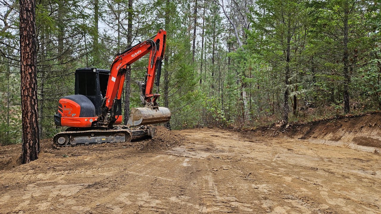 Off grid cabin pad in the woods with the Kubota KX 040 4 excavator