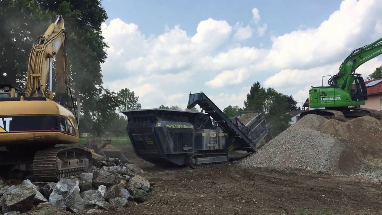 Bauschutt brechen mit Rubble Master RM 120 GO & Kobelco SK260 SR