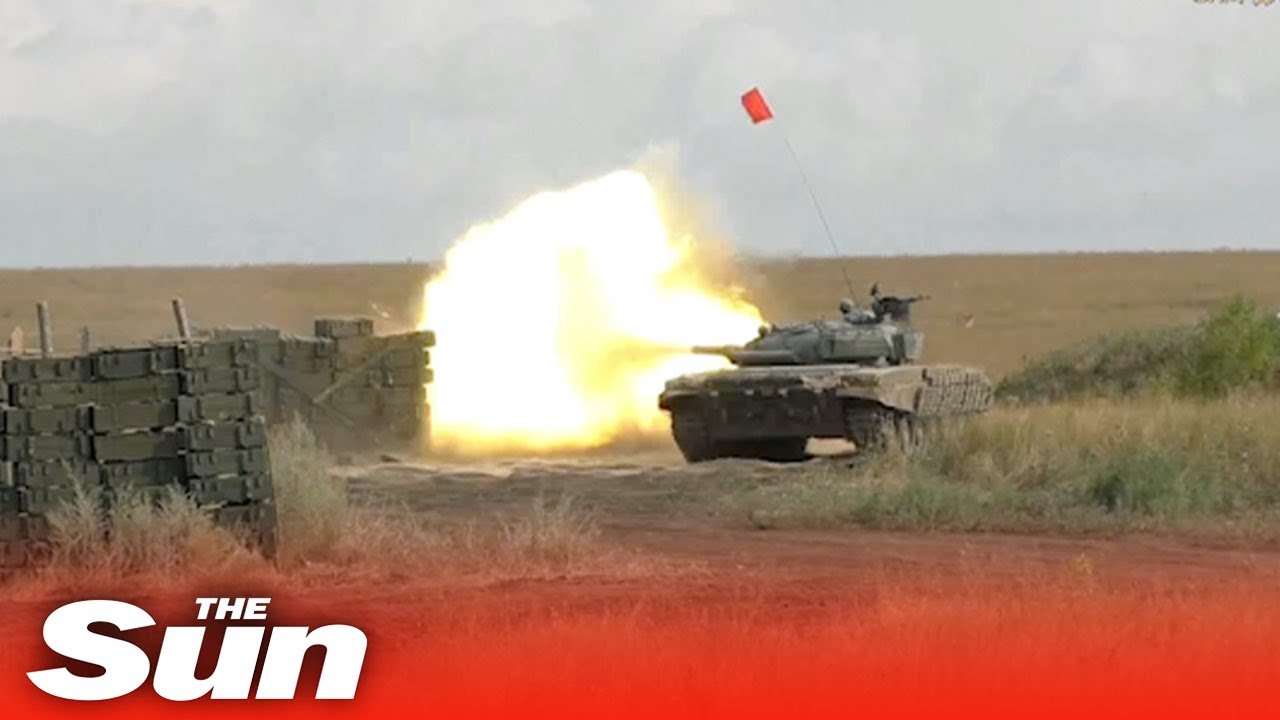 Pro-Russian forces carry out explosive tank drills in Donetsk