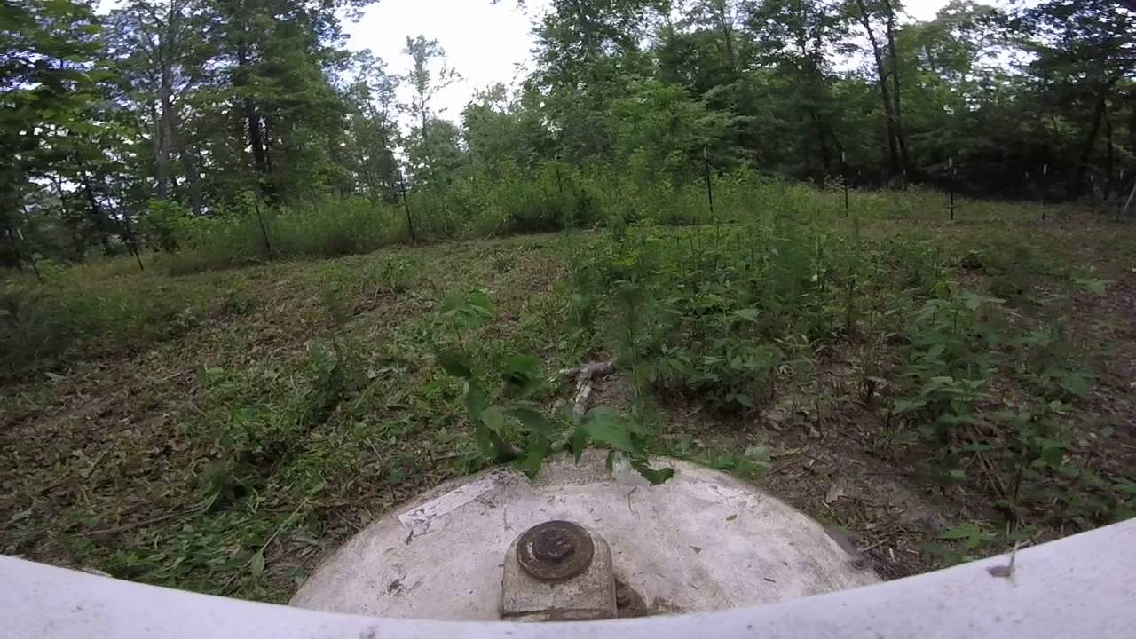 Gravely brush hogging woods (hood view)