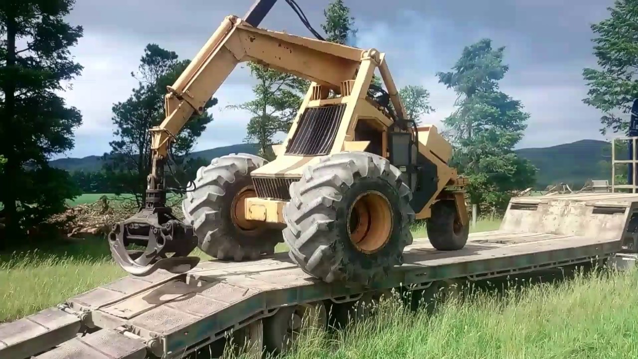Bell Loading/Unloading Logging Vehicle