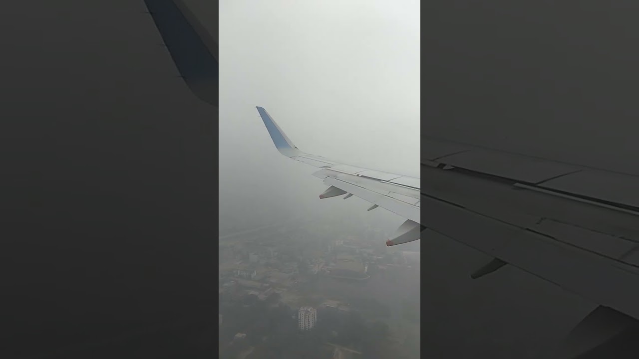 Plane landing in dense fog.