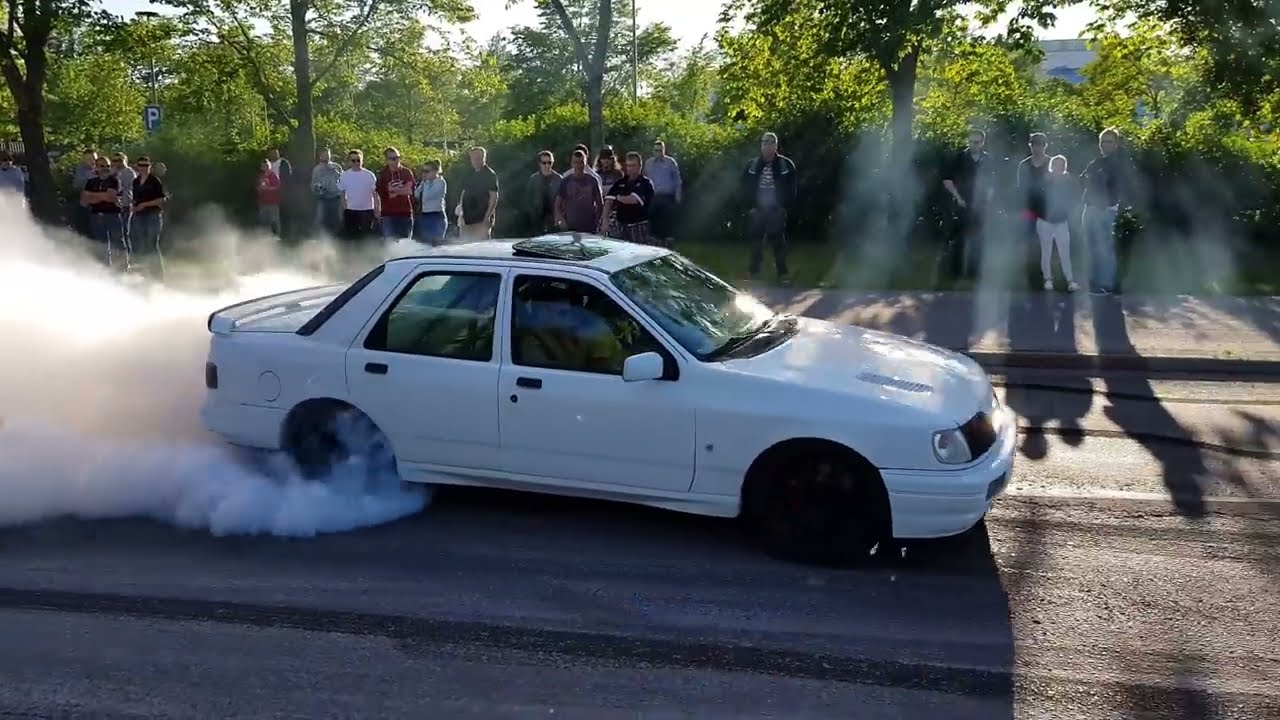 Modified Cars Leaving a Car Meet With Style