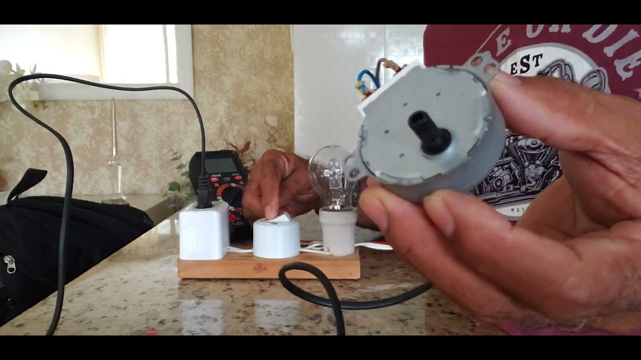 como testar motor do prato do microondas?