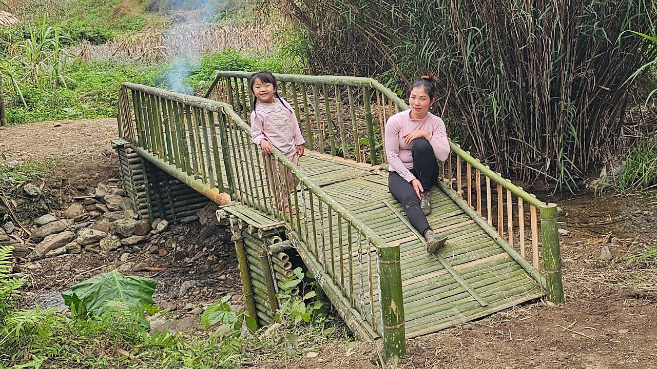 Building and completing a bamboo bridge with my little daughter.