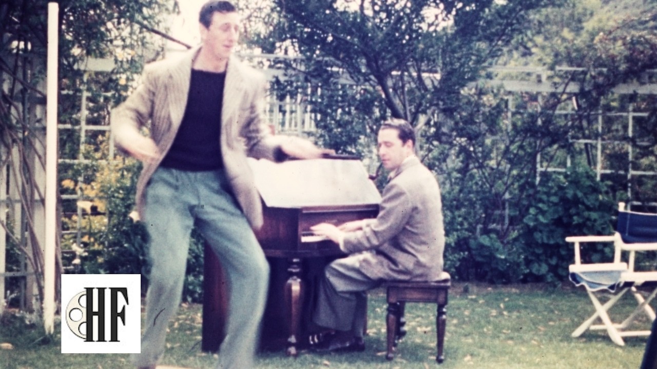 1939  Wizard Of Oz Scarecrow RAY BOLGER and composer HAROLD ARLEN practice routine