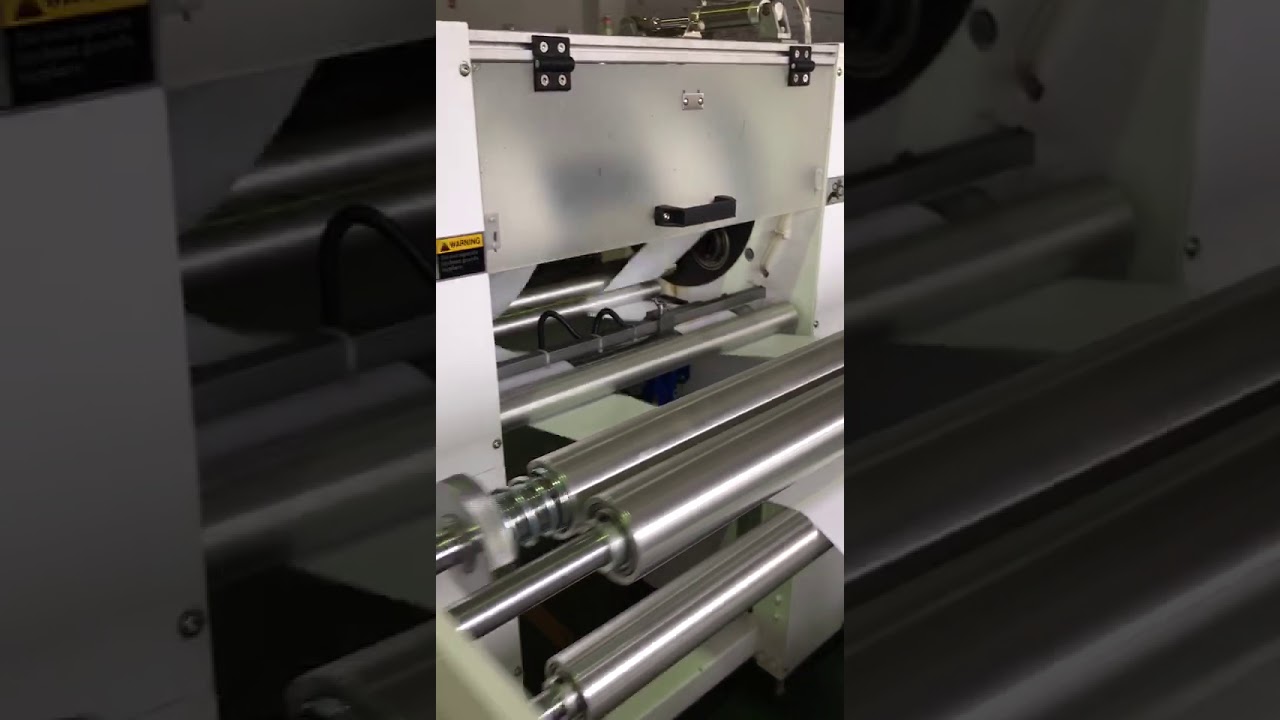 HM-1000MR: 18  Machine running video making star sealing bag
