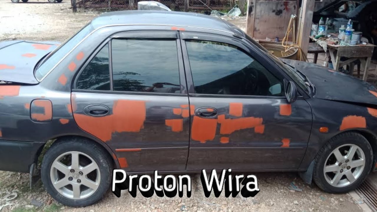 PROTON WIRA DI PERBAHARUI ( WARNA DARK GREY)
