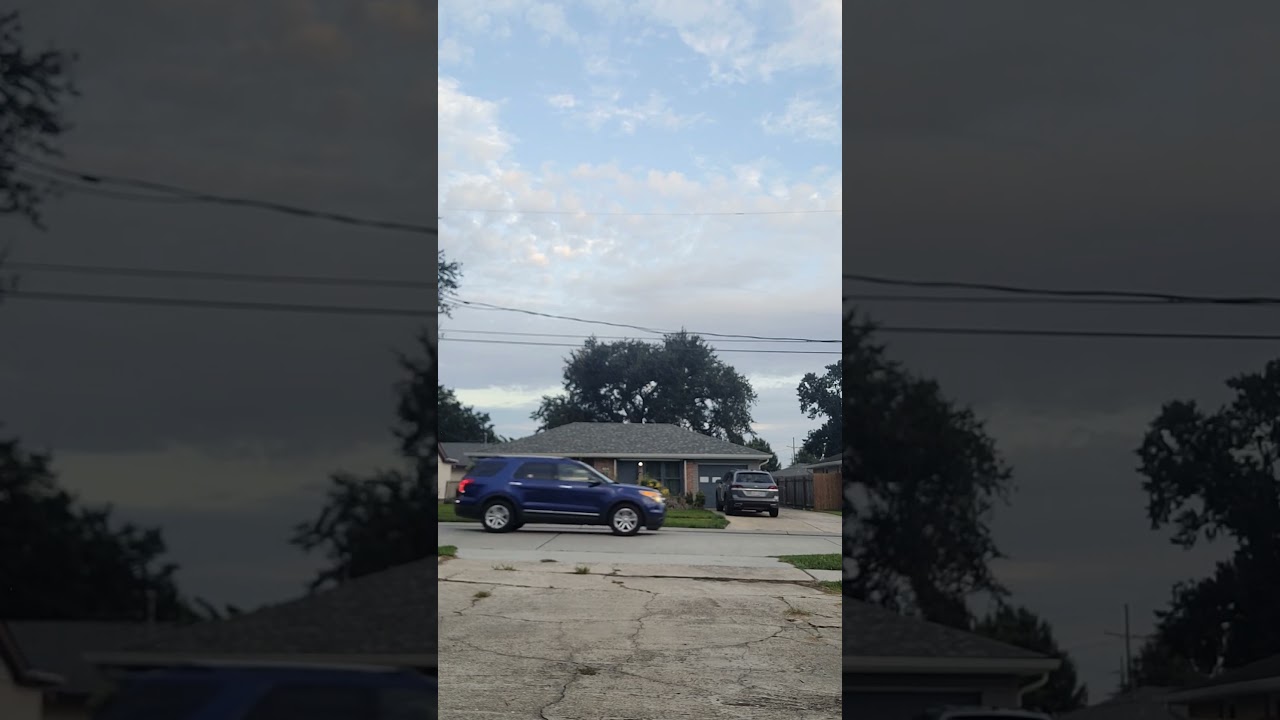 Cars driving down the street