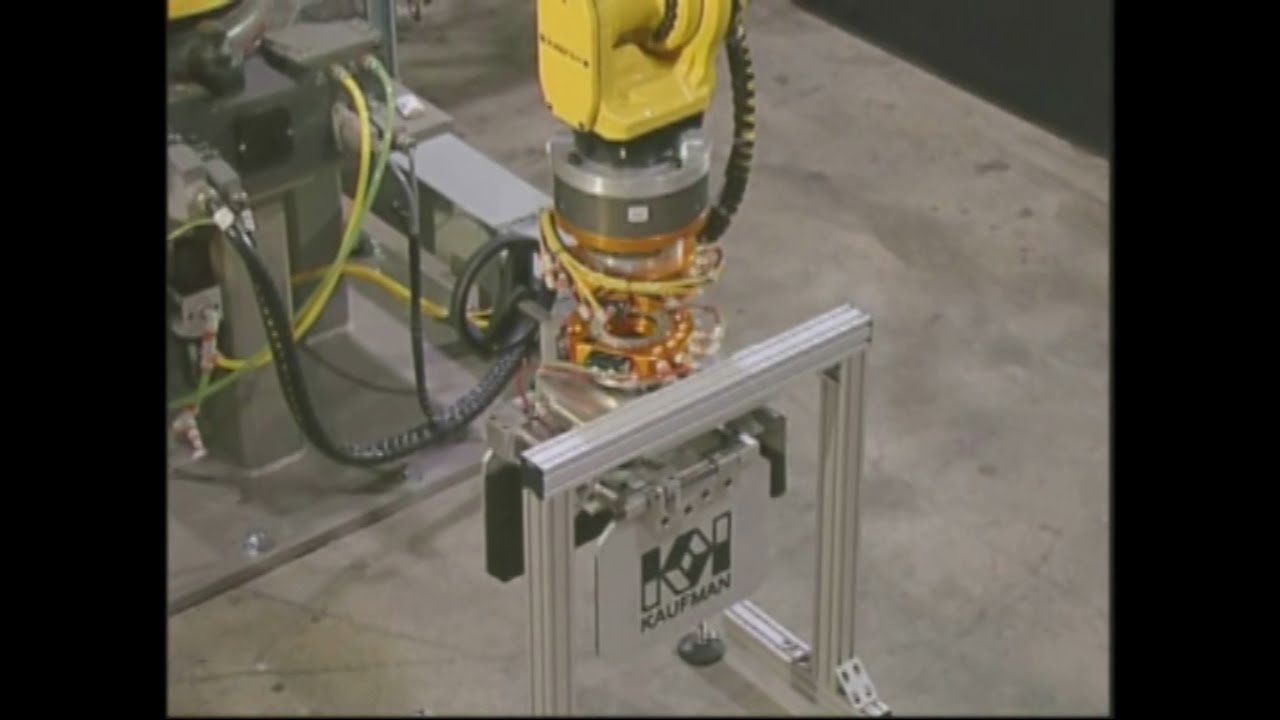 Packaging Robot with Robotic Collision Sensor and Robotic Tool Changer