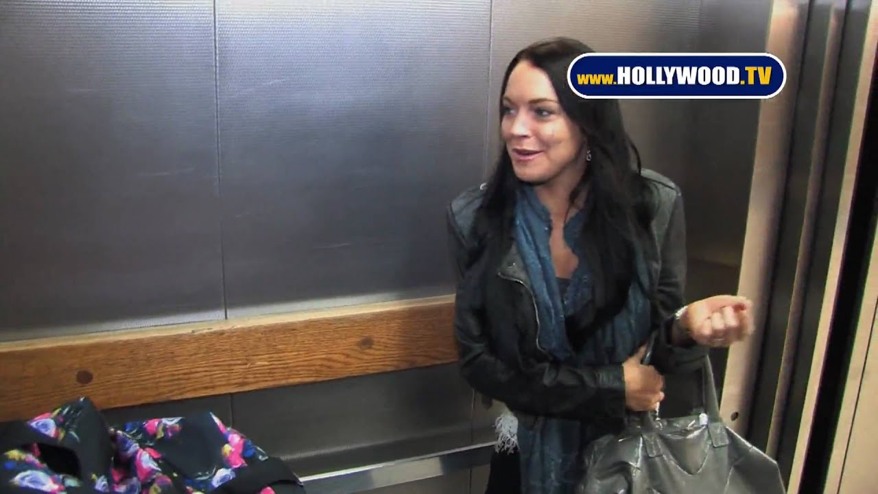 Private Security, Airport Security and Police Restrain Eager Paparazzi From Lindsay & Ali Lohan