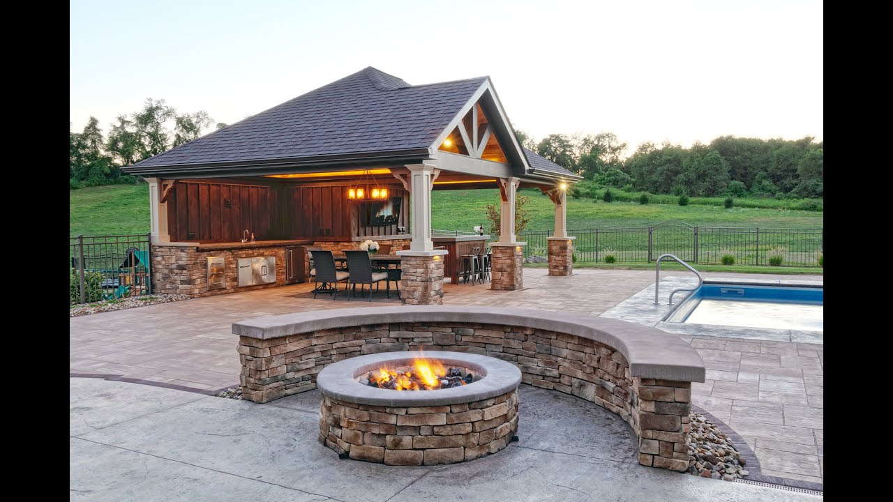 Custom Backyard with Pool House in Penn Trafford