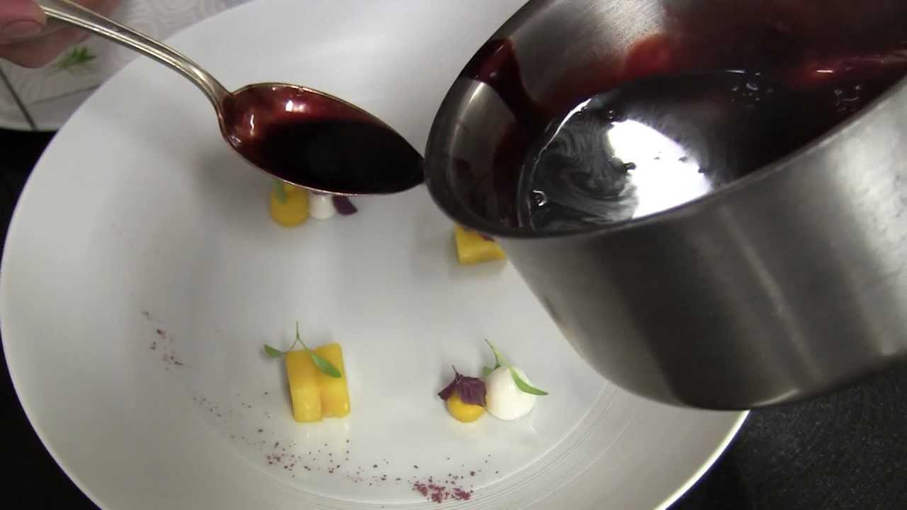 Amador prepares one of his signature dishes at his 3 Michelin restaurant