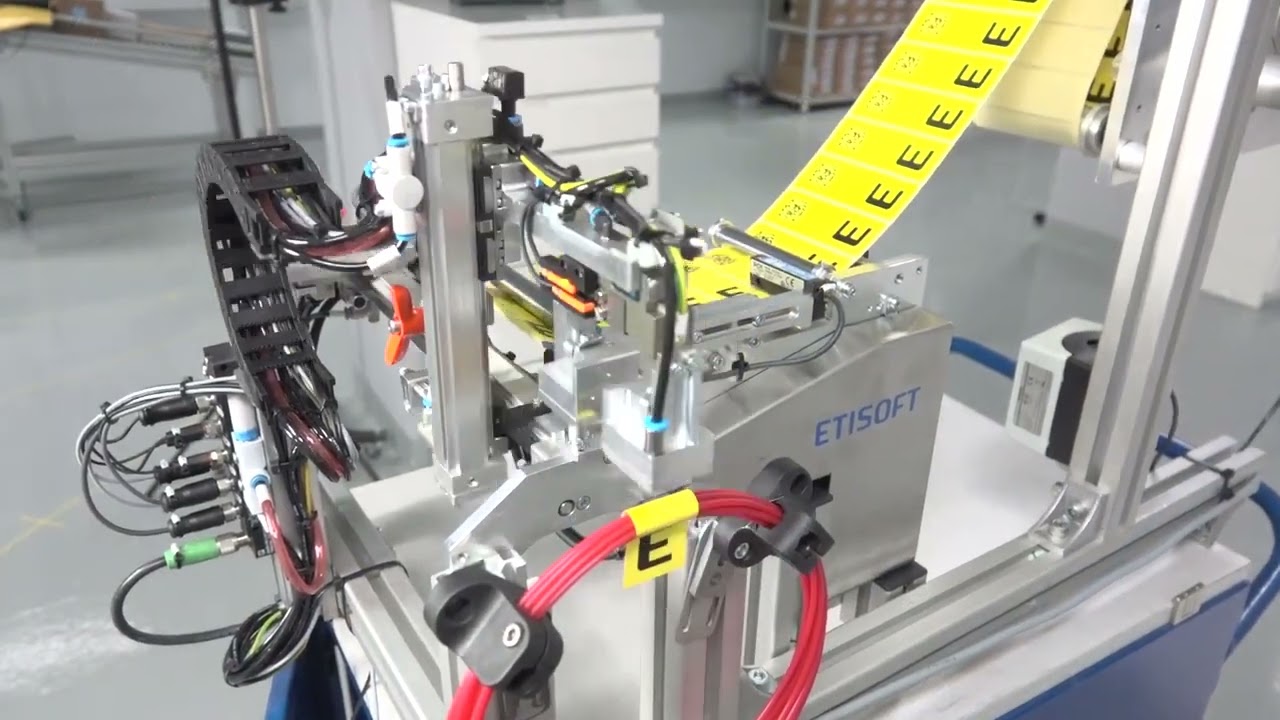 Flag label application. How to automate the labelling of long products with a circular cross-section