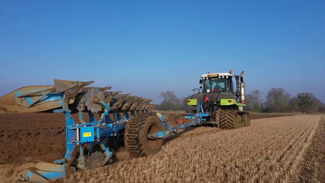 Claas 95E ploughing with Lemken Diamond 11 plough