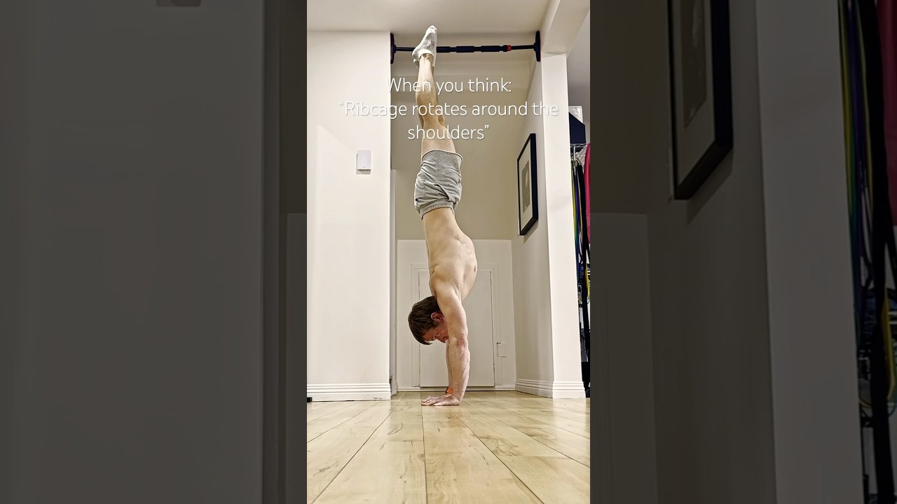 Handstand alignment: arms pressing back vs ribcage rotates around the shoulders. 