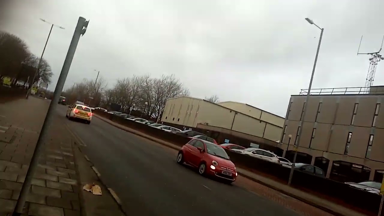 police car leaving St Helens Police Station