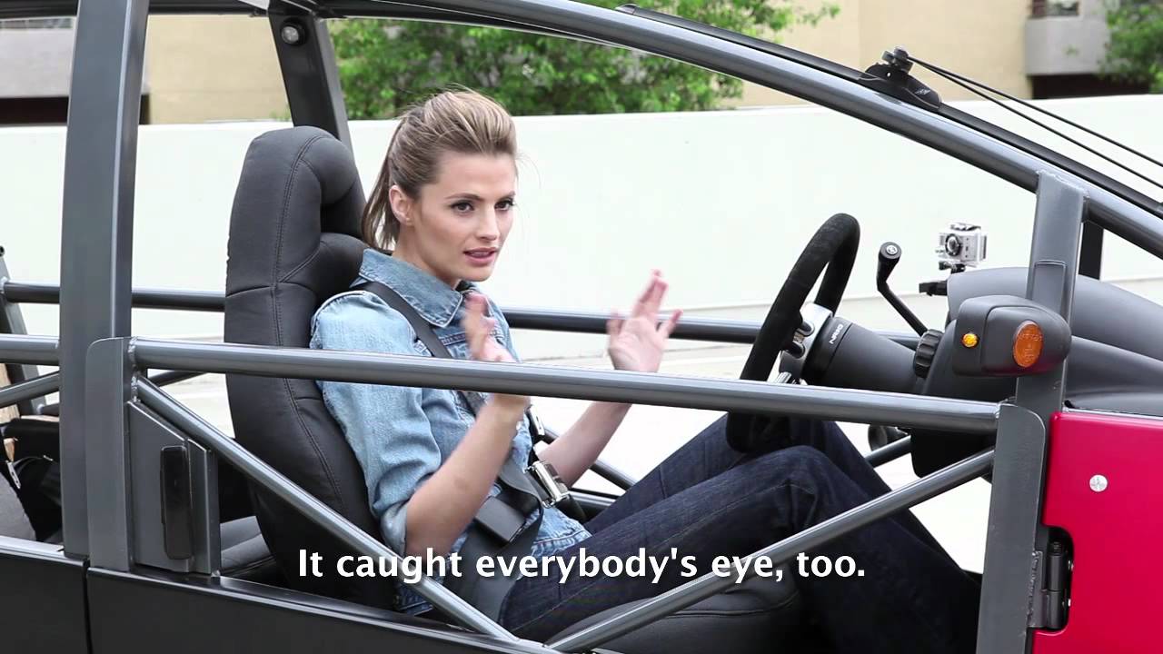 Stana Katic drives the Arcimoto Electric Car
