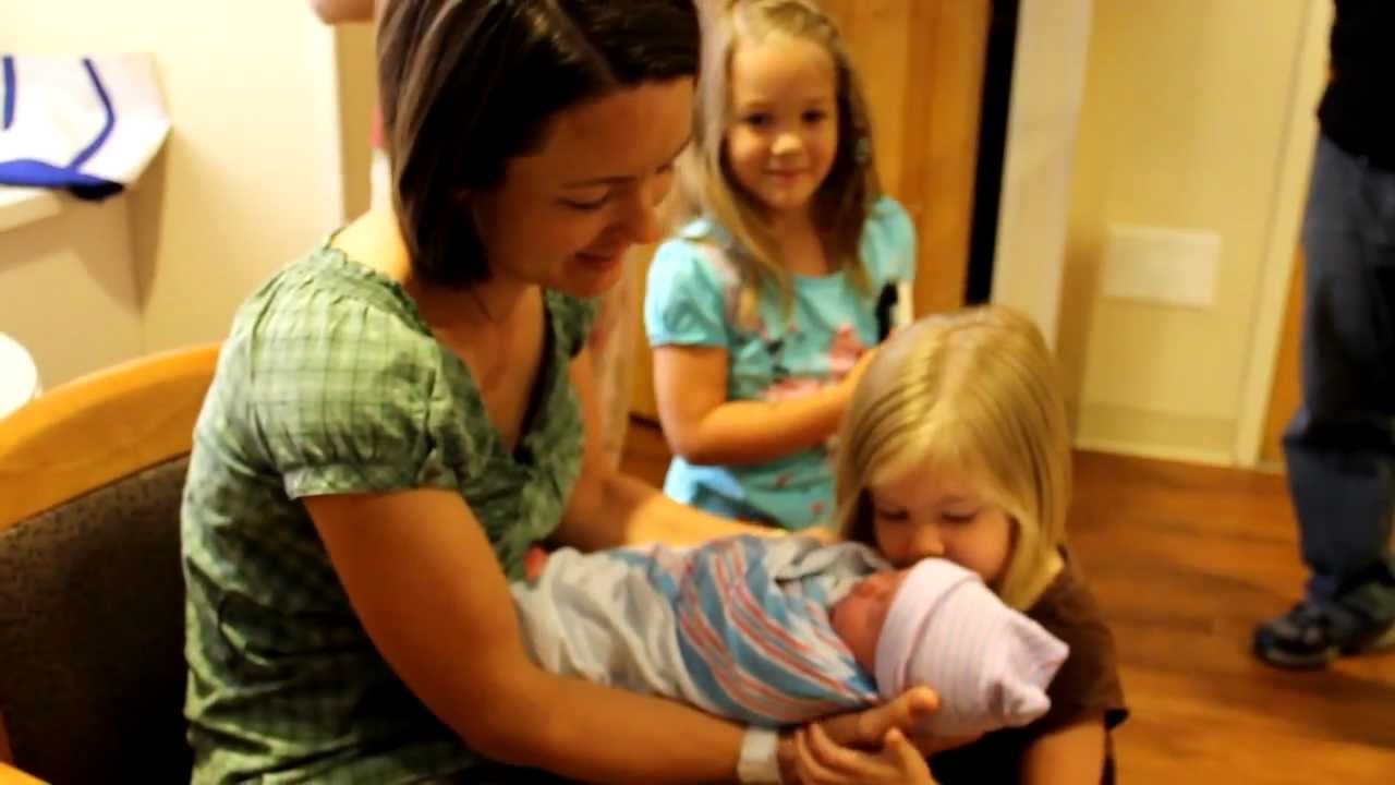 Sisters Meeting Baby Spencer