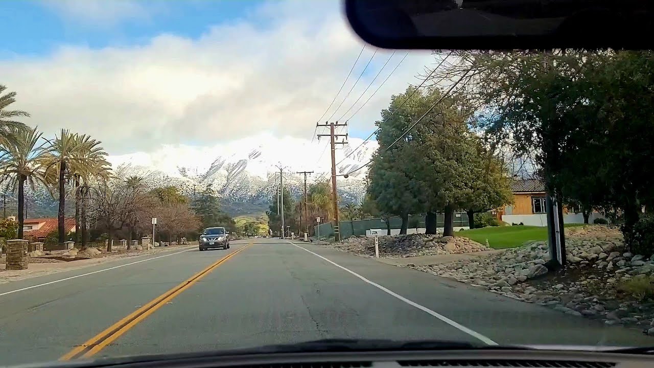 Driving around the beautiful streets of Claremont California with views of snow capped Mt Baldy