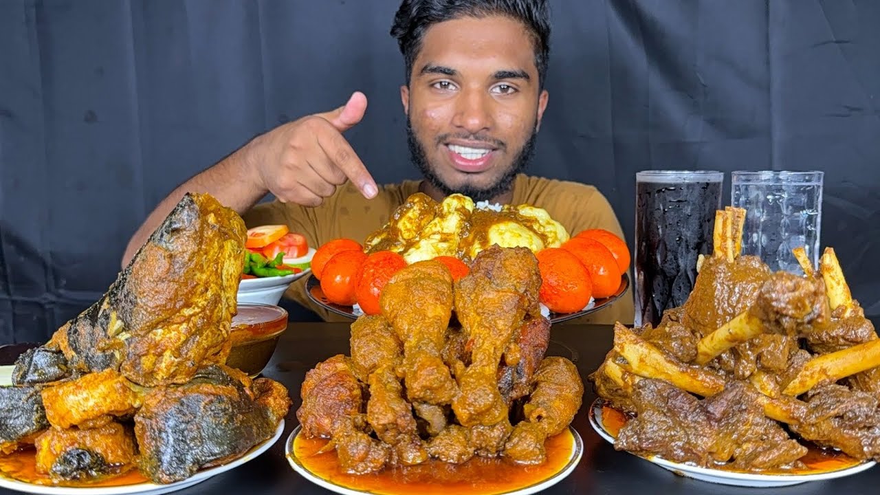 spicy mutton curry, chicken leg piece curry, fish curry, egg curry and mutton fat with rice eating